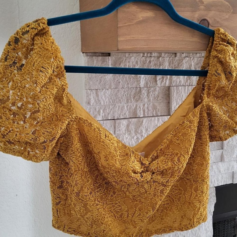 Mustard color top, Price is Firm.